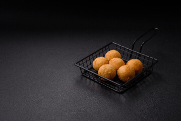 Fast food cheese balls breaded with salt and spices