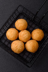 Fast food cheese balls breaded with salt and spices