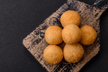 Fast food cheese balls breaded with salt and spices