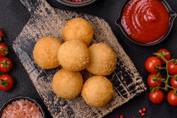 Fast food cheese balls breaded with salt and spices