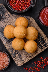 Fast food cheese balls breaded with salt and spices