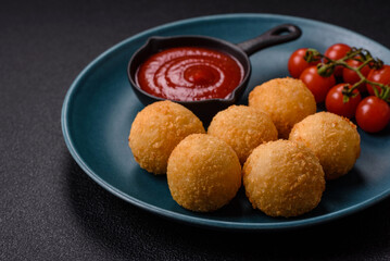 Fast food cheese balls breaded with salt and spices