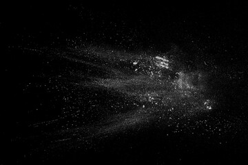 White powder scattered on black background, clipping path