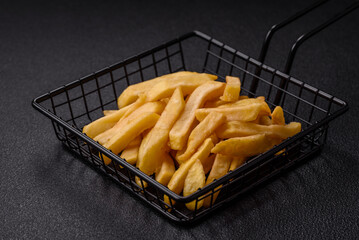 Fast food french fries with salt and spices