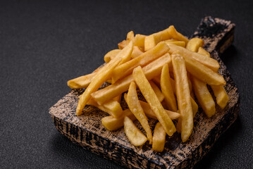 Fast food french fries with salt and spices