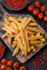 Fast food french fries with salt and spices