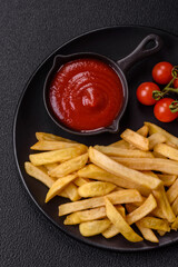 Fast food french fries with salt and spices