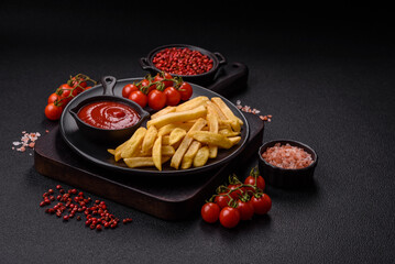Fast food french fries with salt and spices