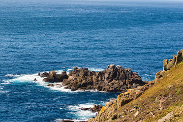 Scenic Coastal View with Rocky Cliffs at Land's End in Cornwall, UK