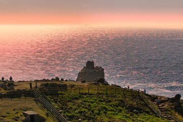 Sunset Over Rocky Coastline at Land's End in Cornwall, UK