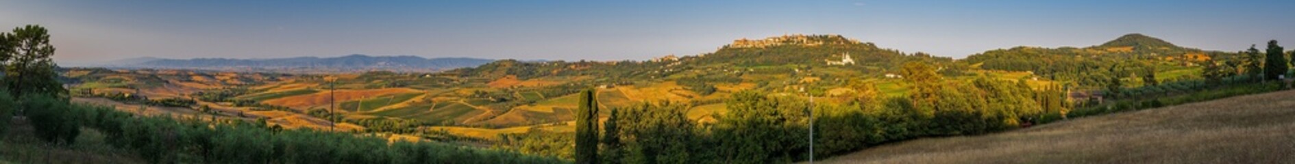 Medieval and Renaissance hilltown Montepulciano with tuscan landscape in the Italian province of Siena in southern Tuscany, Italy
