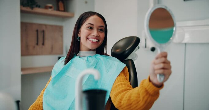 Woman, dentistry and happy with mirror for dental surgery in clinic with teeth whitening and treatment. Female patient, satisfied and smile with results for canal procedure, hygiene and oral care