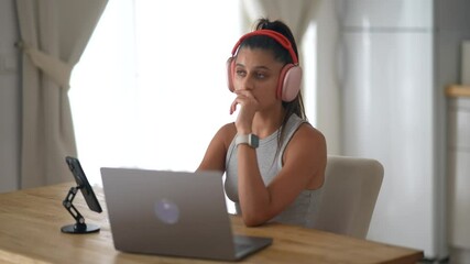 An actively engaged female content creator is currently participating in a video call session - Powered by Adobe