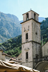 Fototapeta premium Church Towers and Rooftops of Kotor, Bay of Kotor, Montenegro - Roofs and Churches Walled City Old Town