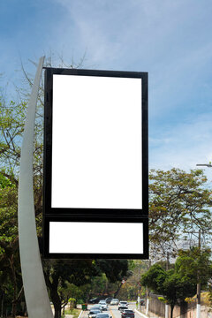 Digital street clock on an avenue in S&atilde;o Paulo, photograph with copy space, street furniture.
