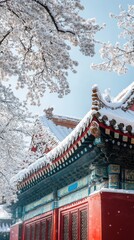 Obraz premium Snow-covered ancient Chinese architecture with intricate design under winter sky