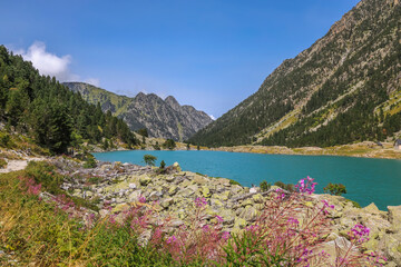 Gaube Lake is a lake in the French Pyrenees, in the department of the Hautes-Pyrénées, near the town of Cauterets.
