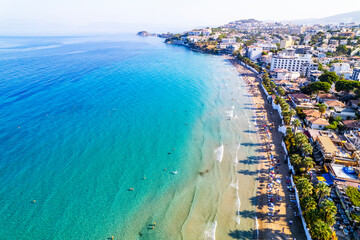 Kusadasi, Aydin, Turkey. Ladies Beach (Turkish: Kadinlar Denizi) in Kusadasi. Touristic beach resort town on Turkey. Aerial view of Kusadasi.