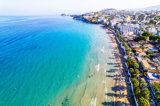Kusadasi, Aydin, Turkey. Ladies Beach (Turkish: Kadinlar Denizi) in Kusadasi. Touristic beach resort town on Turkey. Aerial view of Kusadasi.
