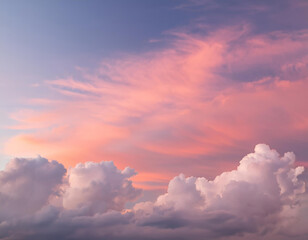 The sky is painted with fluffy clouds in pink, orange, and red hues at sunset, creating a peaceful atmosphere with warm light. Twilight scene with vibrant colors and copy space