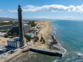 Aerial view of Maspalomas lighthouse and sand dunes, Gran Canaria, Spain.The seafront at Punta de...