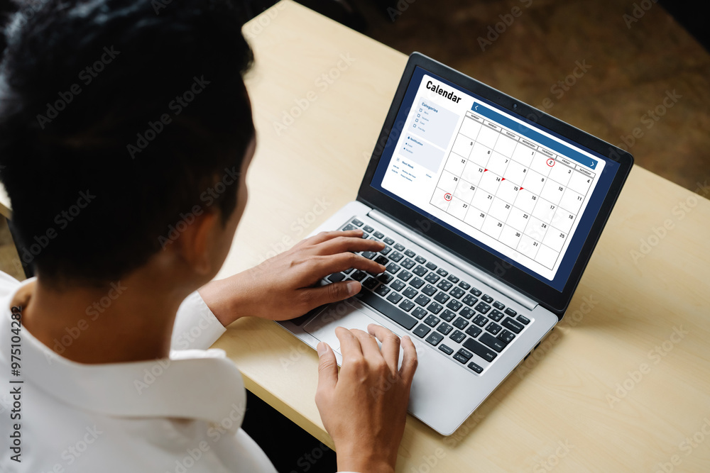 Poster calendar on computer software application for modish schedule planning for personal organizer and on