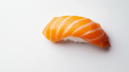 A single piece of salmon nigiri sushi on a white background.