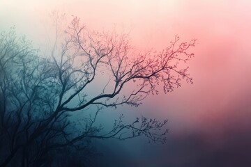 Fototapeta premium Silhouetted Tree Branch Against a Soft Pink and Blue Sky