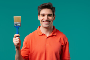 Creative painter artist man with brush on blue background. Fantasy, idea © kohanova1991