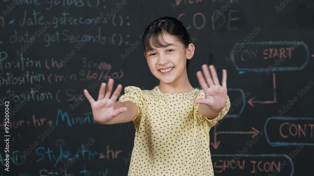 Poster cute happy girl waving to camera while standing at blackboard with engineering prompt or coding, pro