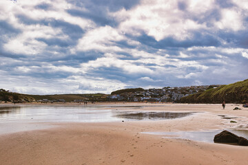 Tranquil Beach with Coastal Town View at Mawgan Porth Beach, Newquay, Cornwall
