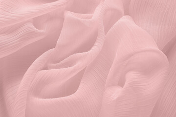 Beautiful pink beige tulle, closeup view of fabric