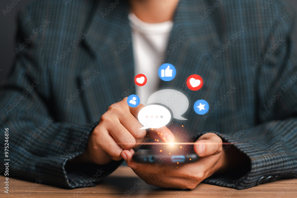 Poster close-up of hands holding a smartphone with social media icons floating above, symbolizing digital o