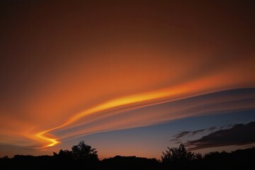 Fototapeta premium Warm Orange Gradient Sky with Glowing Flare Over Twilight Backdrop