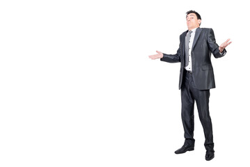 Confused male worker shrugging shoulders in studio