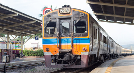 Fototapeta premium Vintage train on railway station transportation on center of capitalcity