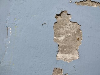 wall paint that is peeling because the wall is damp