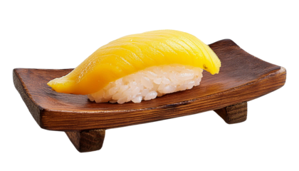 A vibrant slice of mango sushi placed on a wooden platter, showcasing the beautiful colors and textures of this delicious dish.