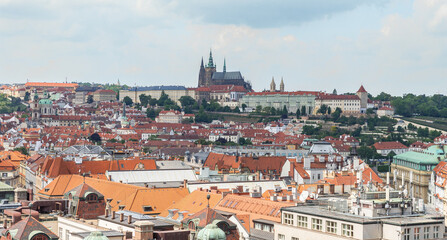 Fototapeta premium View of St Vitus Cathedral and old town from observation platform of Old Town Hall in old part of Prague in Czech Republic