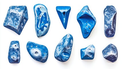 Set collection of various blue artificial climbing holds isolated on white background. indoor sport bouldering extreme sport concept