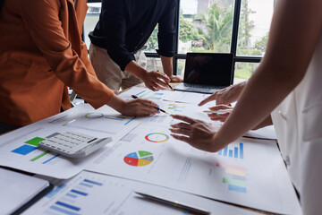 Analyze financial data and accounting record with calculator in meeting office, Accounting company charts and graphs banner, double exposure successful business finance and taxation planning concept.