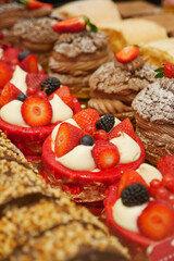 Enjoy delicious assorted pastries and berry tarts, ideal for any occasion, big or small