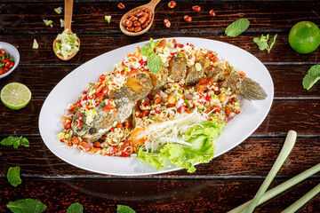 Deep Fried Snakehead Fish with Herb and Spicy Sauce