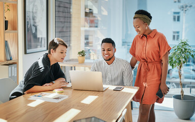 Creative, team and business people with laptop in meeting for design strategy, online campaign and website layout. Graphic designer, collaboration or discussion in boardroom for project brainstorming