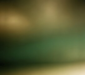 The image is a blurred, abstract representation of a gradient background, with a gradient transitioning from green to yellow.