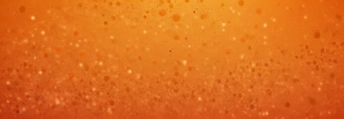a blurred orange background with small white dots scattered throughout, creating a sense of movement and energy.