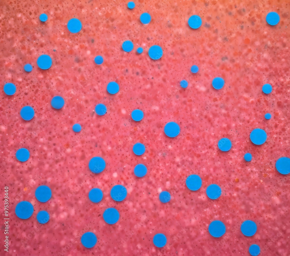 Poster a close-up view of a pinkish-red surface with numerous small blue circles scattered across it, creat