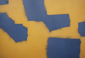 a close-up view of a textured surface with blue and yellow paint strokes, creating an abstract pattern.