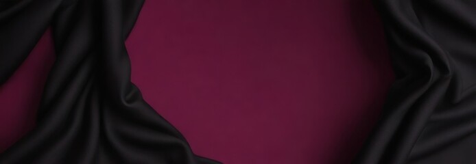 a close-up view of a black fabric with a deep purple background.