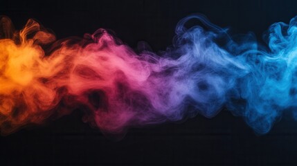 Fototapeta premium Colorful smoke swirls creating an ethereal pattern on a black background